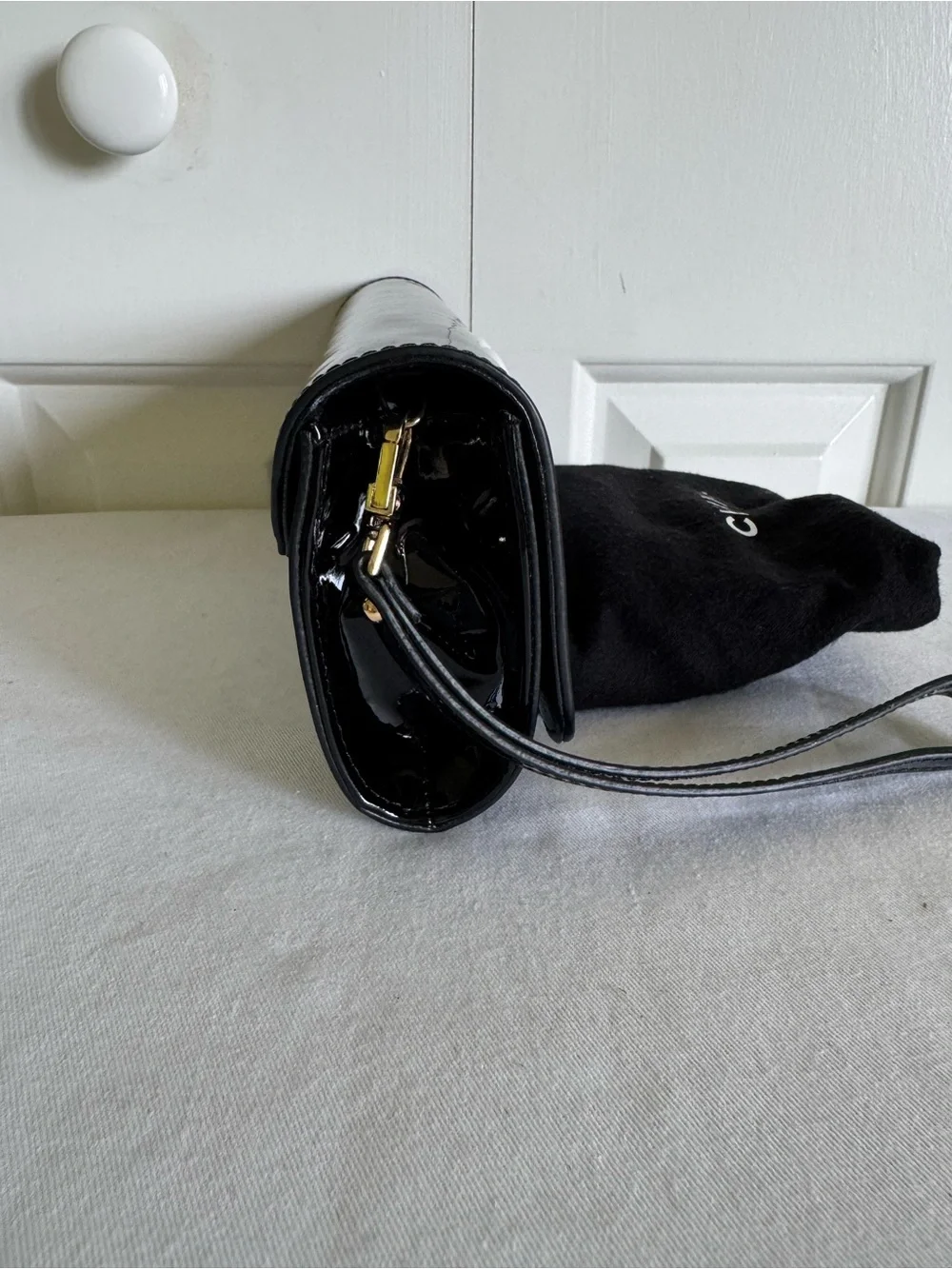 Black Patent Leather Wristlet Clutch with White CC Emblem